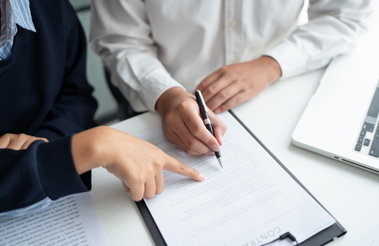 lawyer and client are reviewing the document