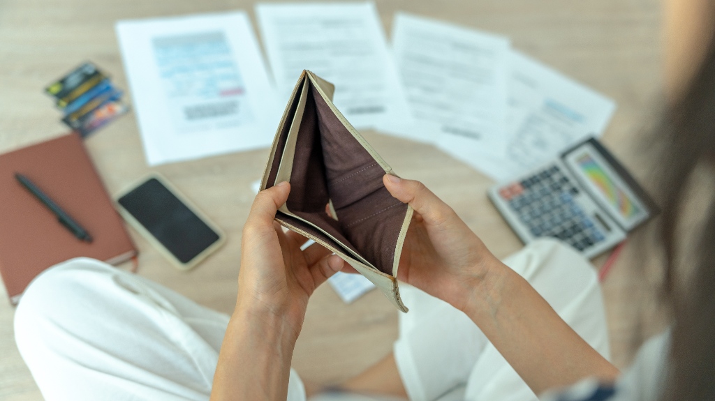 Woman managing debt and expenses